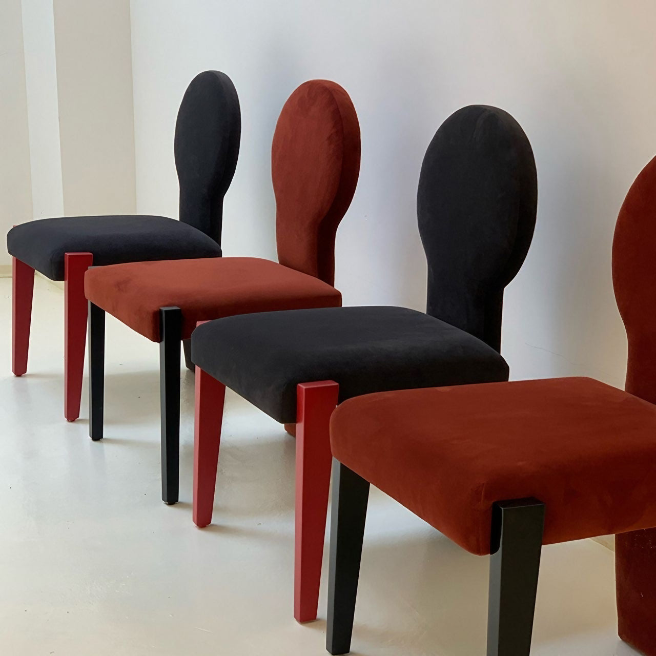 Elegant Red Velvet Makeup Chair with Unique Design