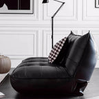 Black retro microfiber leather sofa bed with reclining and armless design for versatile comfort