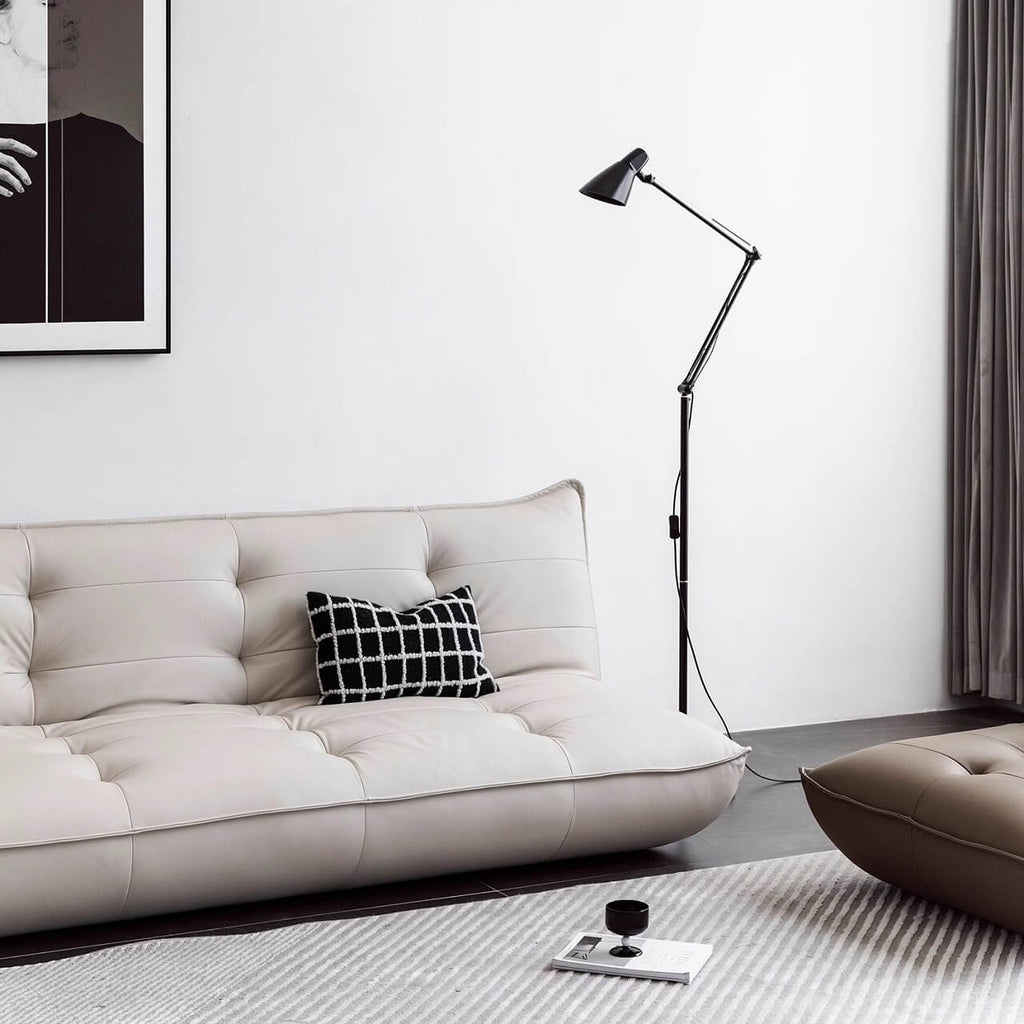 Black retro microfiber leather sofa bed with reclining and armless design for versatile comfort