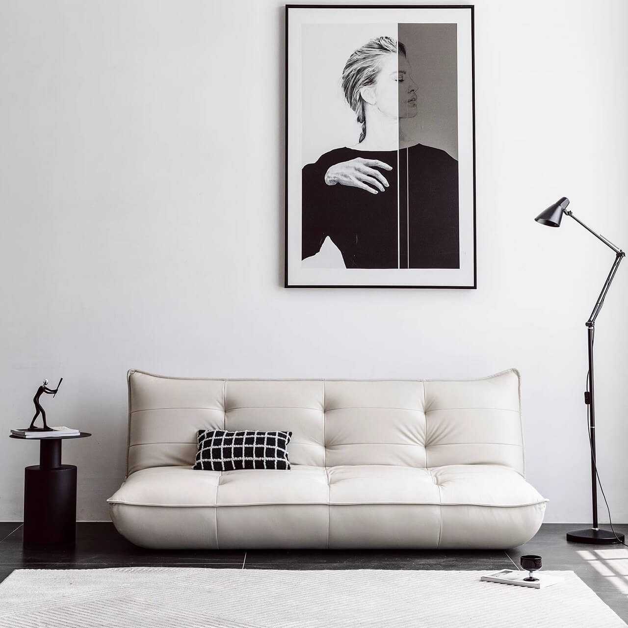 Black retro microfiber leather sofa bed with reclining and armless design for versatile comfort