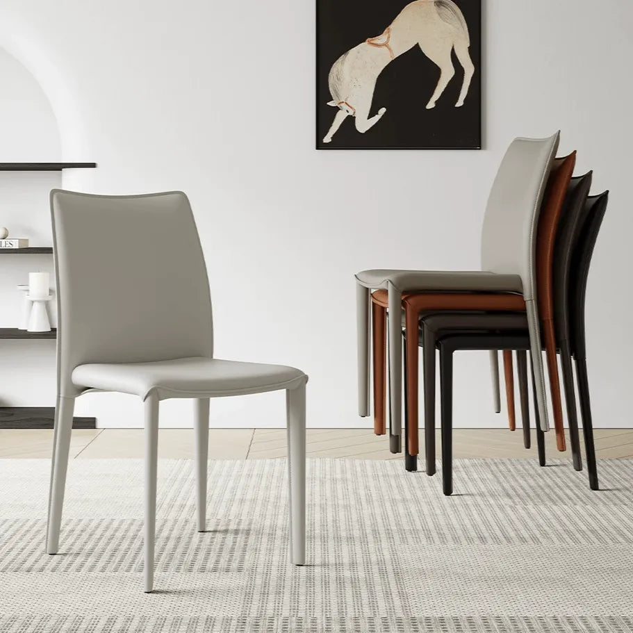 Saddle Leather Dining Chair Series with Sculpted Curves and Stackable Form
