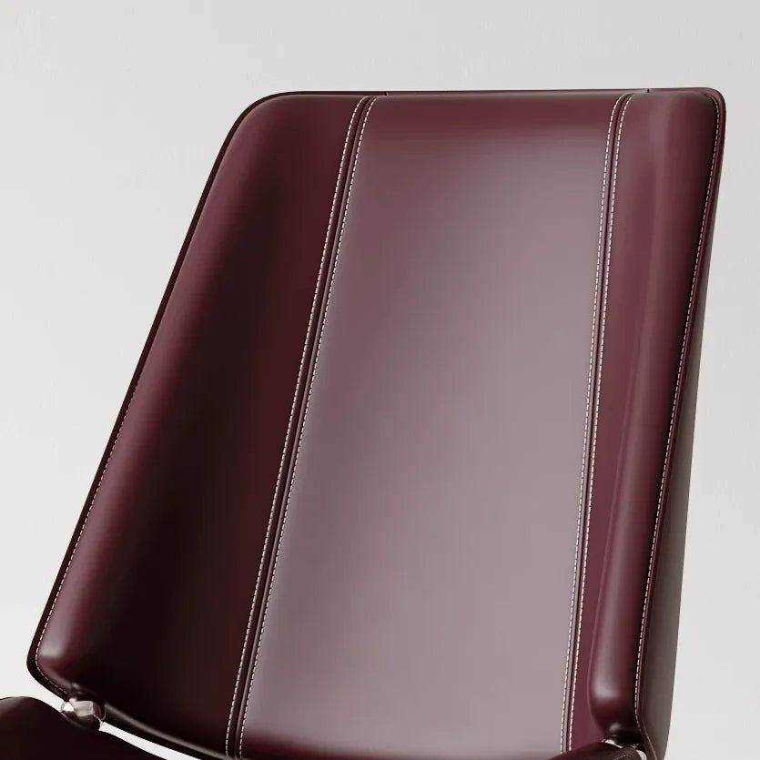 Saddle Leather Dining Chair with Sculpted Back and Slim Metal Legs