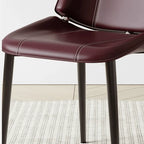 Saddle Leather Dining Chair with Sculpted Back and Slim Metal Legs