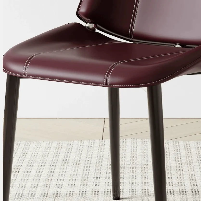 Saddle Leather Dining Chair with Sculpted Back and Slim Metal Legs