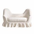 Sculpted Curved Ruffle Skirt Loveseat in Warm Ivory Textured Upholstery