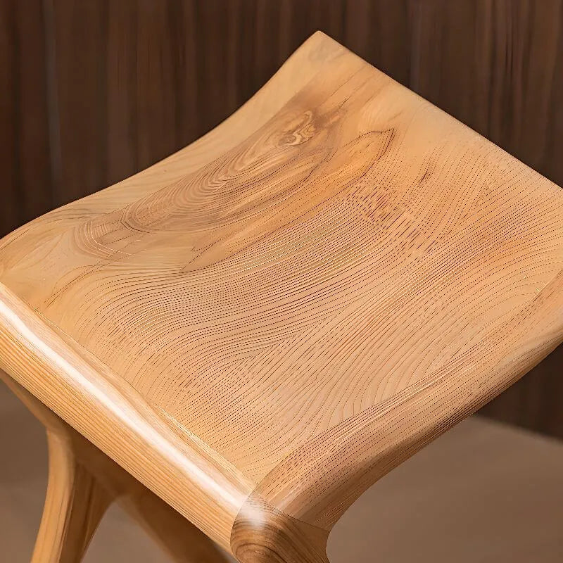 Sculpted Solid Wood Bar Stool with X Base and Ergonomic Saddle Seat
