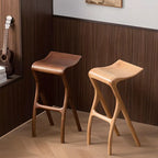 Sculpted Solid Wood Bar Stool with X Base and Ergonomic Saddle Seat