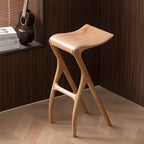 Sculpted Solid Wood Bar Stool with X Base and Ergonomic Saddle Seat