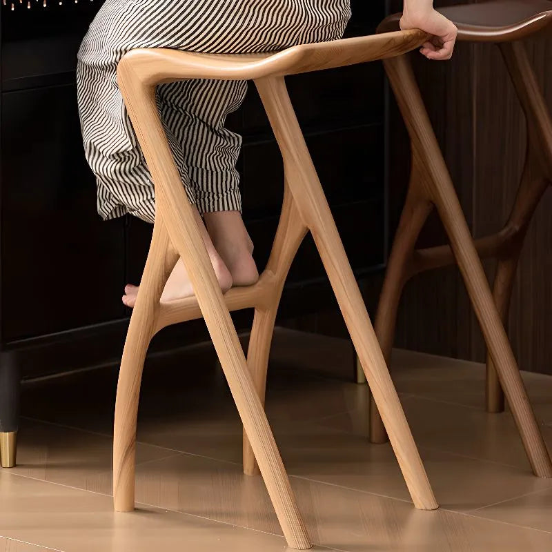 Sculpted Solid Wood Bar Stool with X Base and Ergonomic Saddle Seat