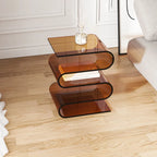 Sculptural Acrylic Side Table With Wave Silhouette and Tiered Display Shelves Main Product Image