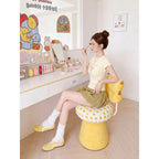 Sculptural Banana Vanity Stool with Swivel Base and Dopamine Decor