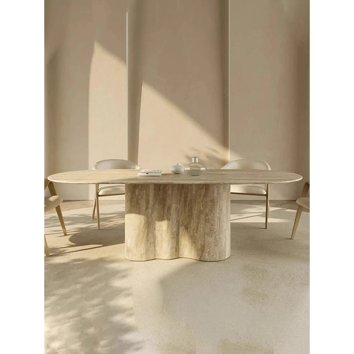 Sculptural Beige Travertine Dining Table with Oval Top and Pedestal Base Main Product Image Imagen principal del producto