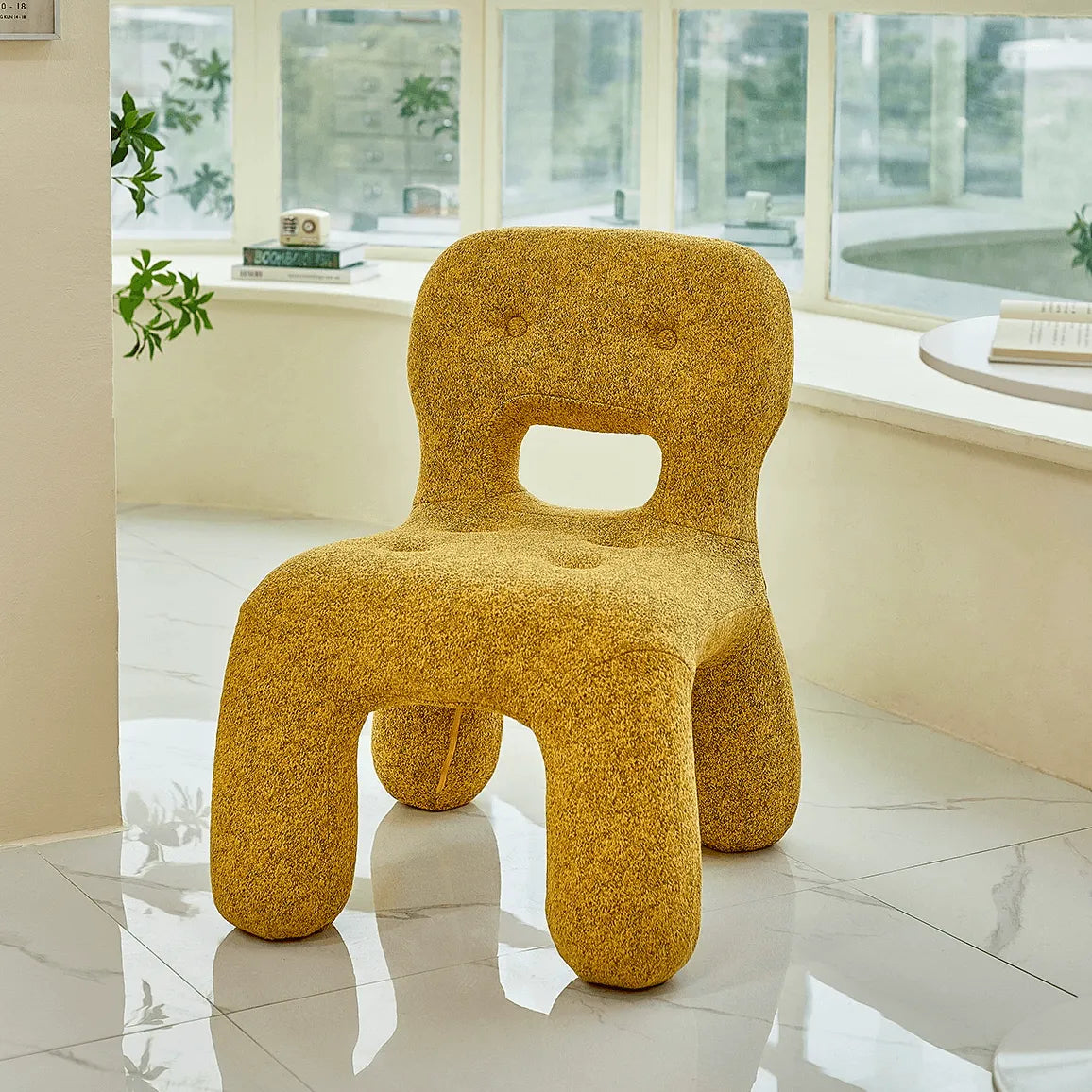 Sculptural Boucle Kids Chair With Rounded Cutout Back and Playful Colors