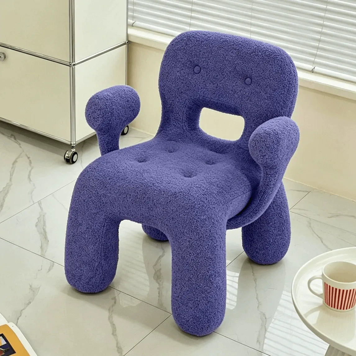 Sculptural Boucle Kids Chair With Rounded Cutout Back and Playful Colors