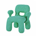 Sculptural Boucle Kids Chair With Rounded Cutout Back and Playful Colors