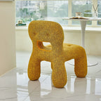 Sculptural Boucle Kids Chair With Rounded Cutout Back and Playful Colors