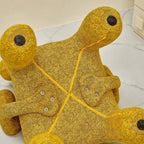 Sculptural Boucle Kids Chair With Rounded Cutout Back and Playful Colors