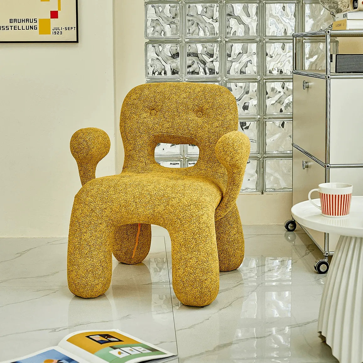 Sculptural Boucle Kids Chair With Rounded Cutout Back and Playful Colors