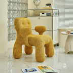 Sculptural Boucle Kids Chair With Rounded Cutout Back and Playful Colors