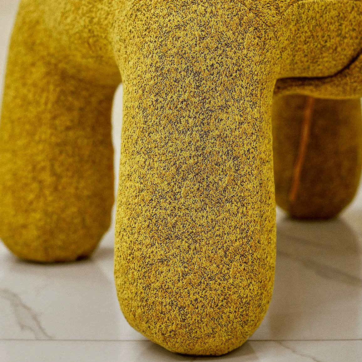 Sculptural Boucle Kids Chair With Rounded Cutout Back and Playful Colors