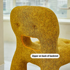 Sculptural Boucle Kids Chair With Rounded Cutout Back and Playful Colors