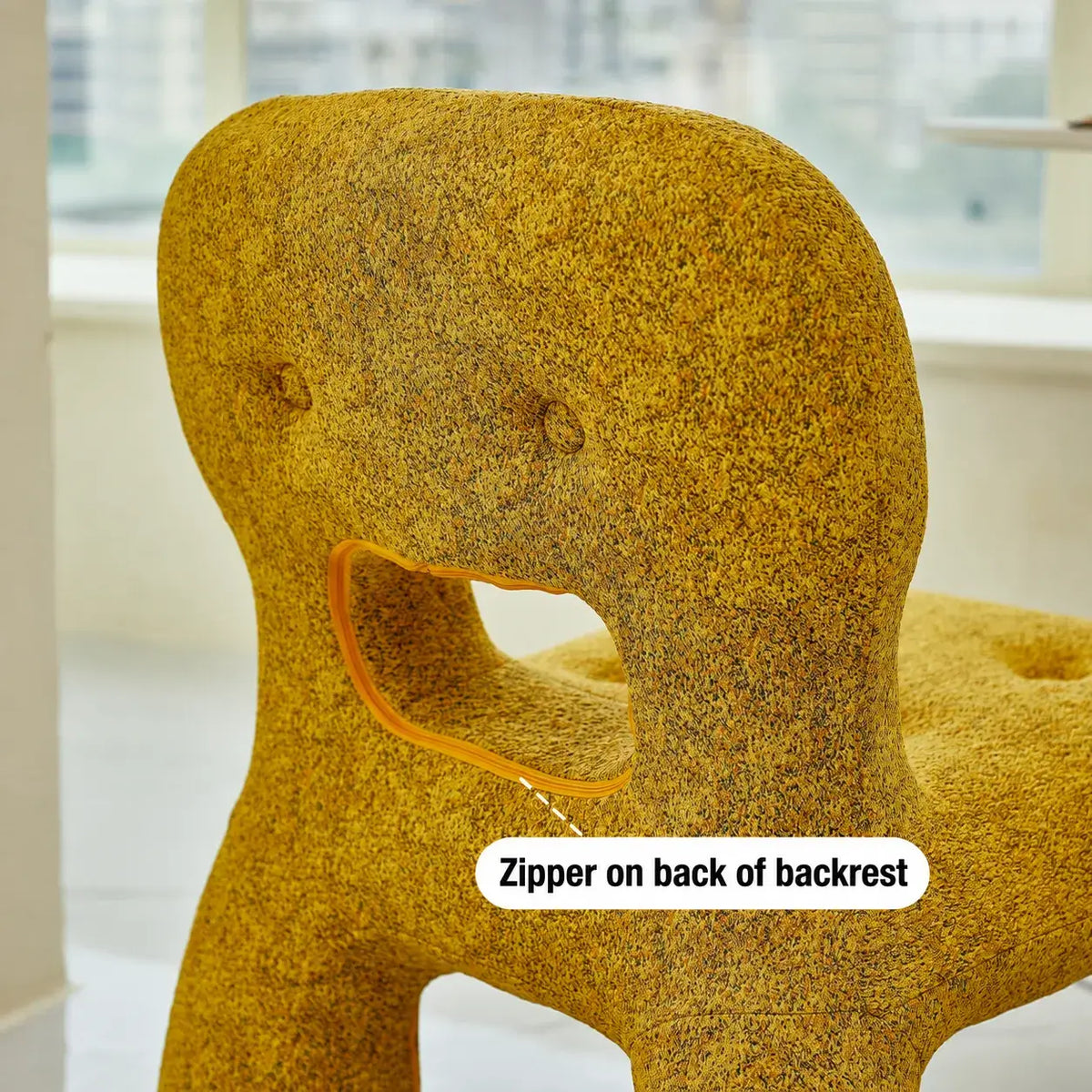 Sculptural Boucle Kids Chair With Rounded Cutout Back and Playful Colors
