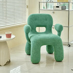 Sculptural Boucle Kids Chair With Rounded Cutout Back and Playful Colors