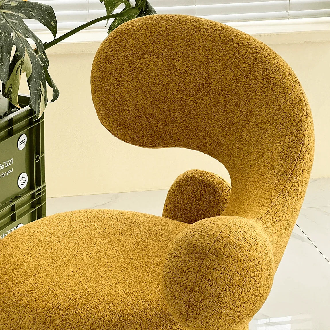 Sculptural Curved Accent Chair with Plush Texture and Bold Colors