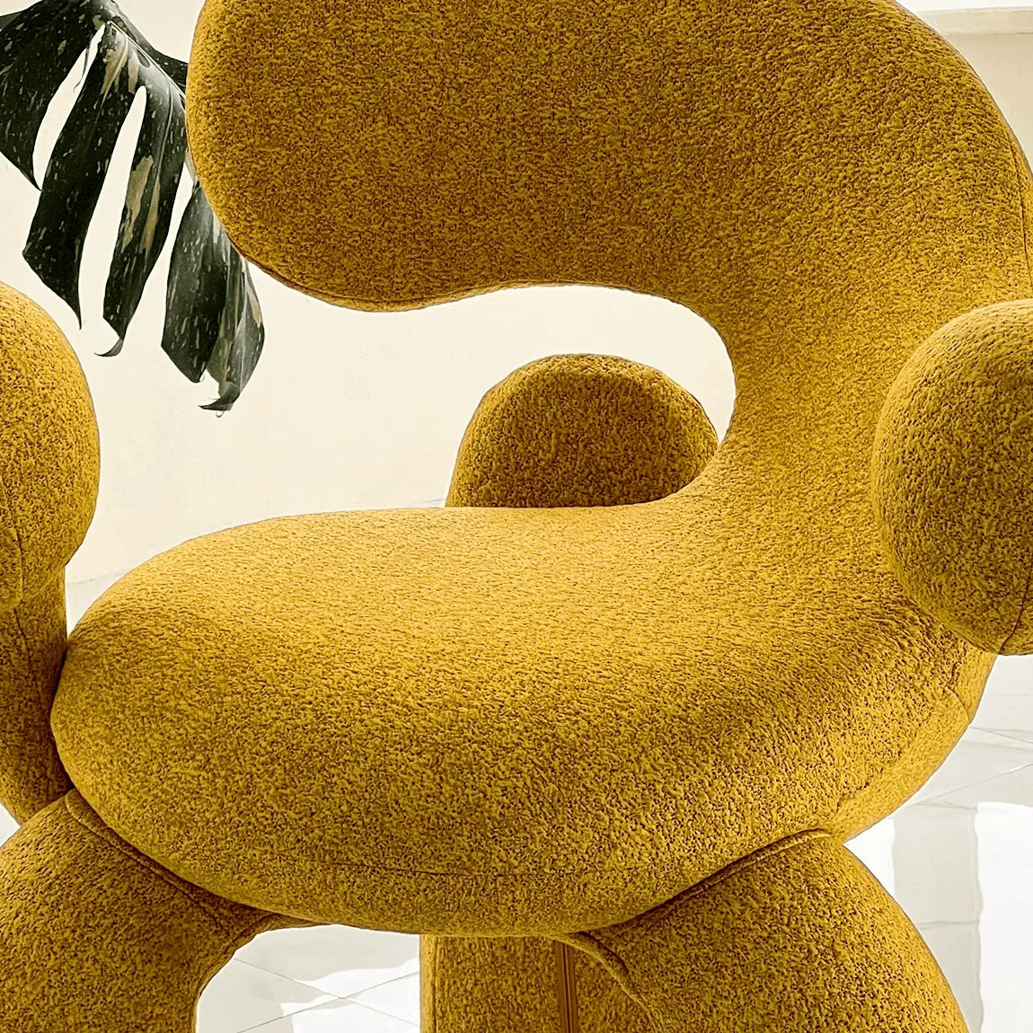 Sculptural Curved Accent Chair with Plush Texture and Bold Colors