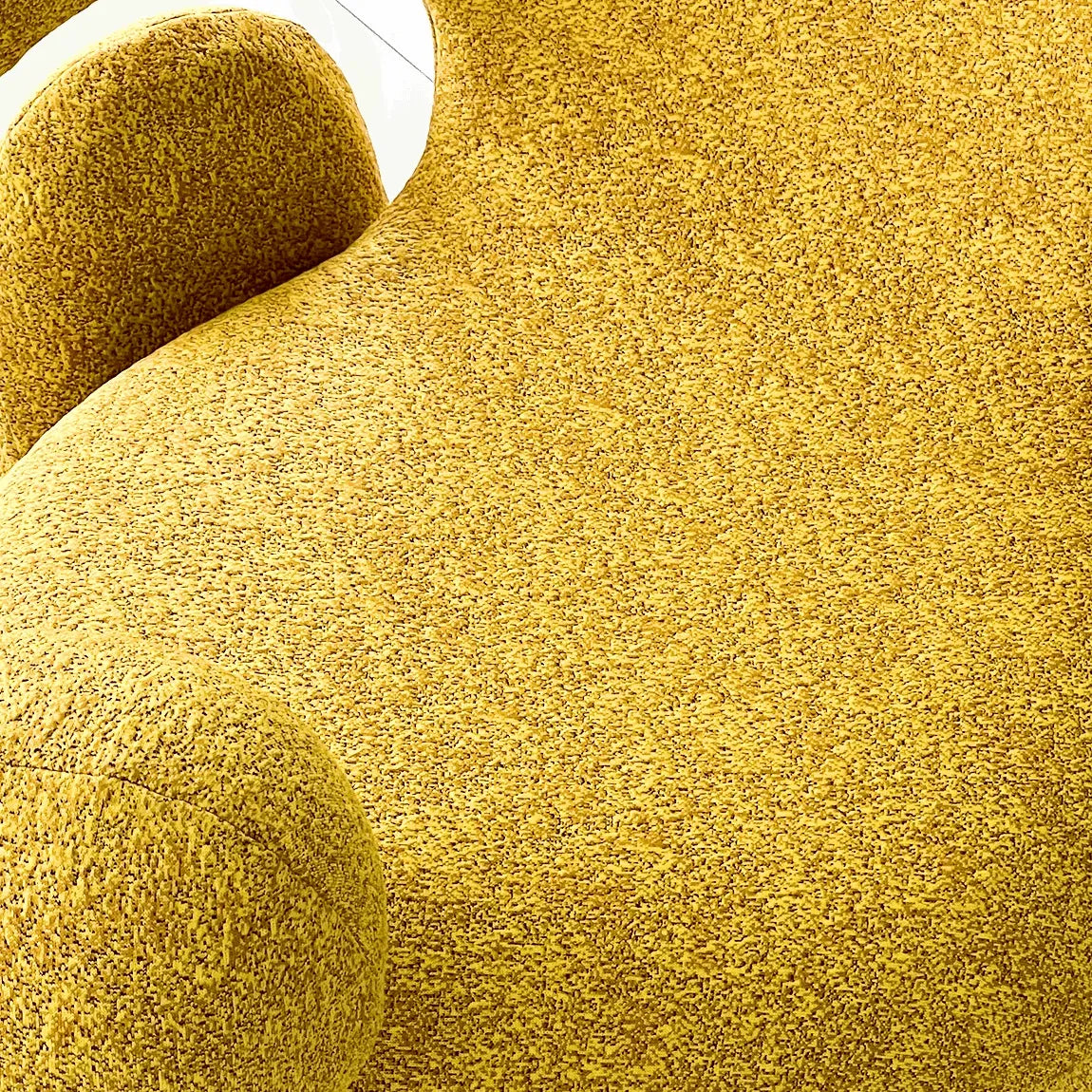 Sculptural Curved Accent Chair with Plush Texture and Bold Colors
