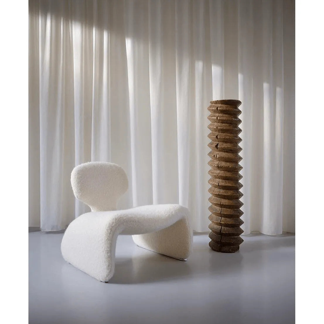 Sculptural Djinn Chair in Plush Upholstery for Gallery Lounge Spaces