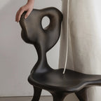 Sculptural Fiberglass Accent Chair with Cutout Back and Tripod Base