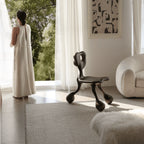 Sculptural Fiberglass Accent Chair with Cutout Back and Tripod Base