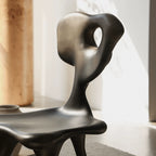 Sculptural Fiberglass Accent Chair with Cutout Back and Tripod Base