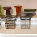 Sculptural Glass Accent Table Series With Gradient Tones and Rounded Block Forms