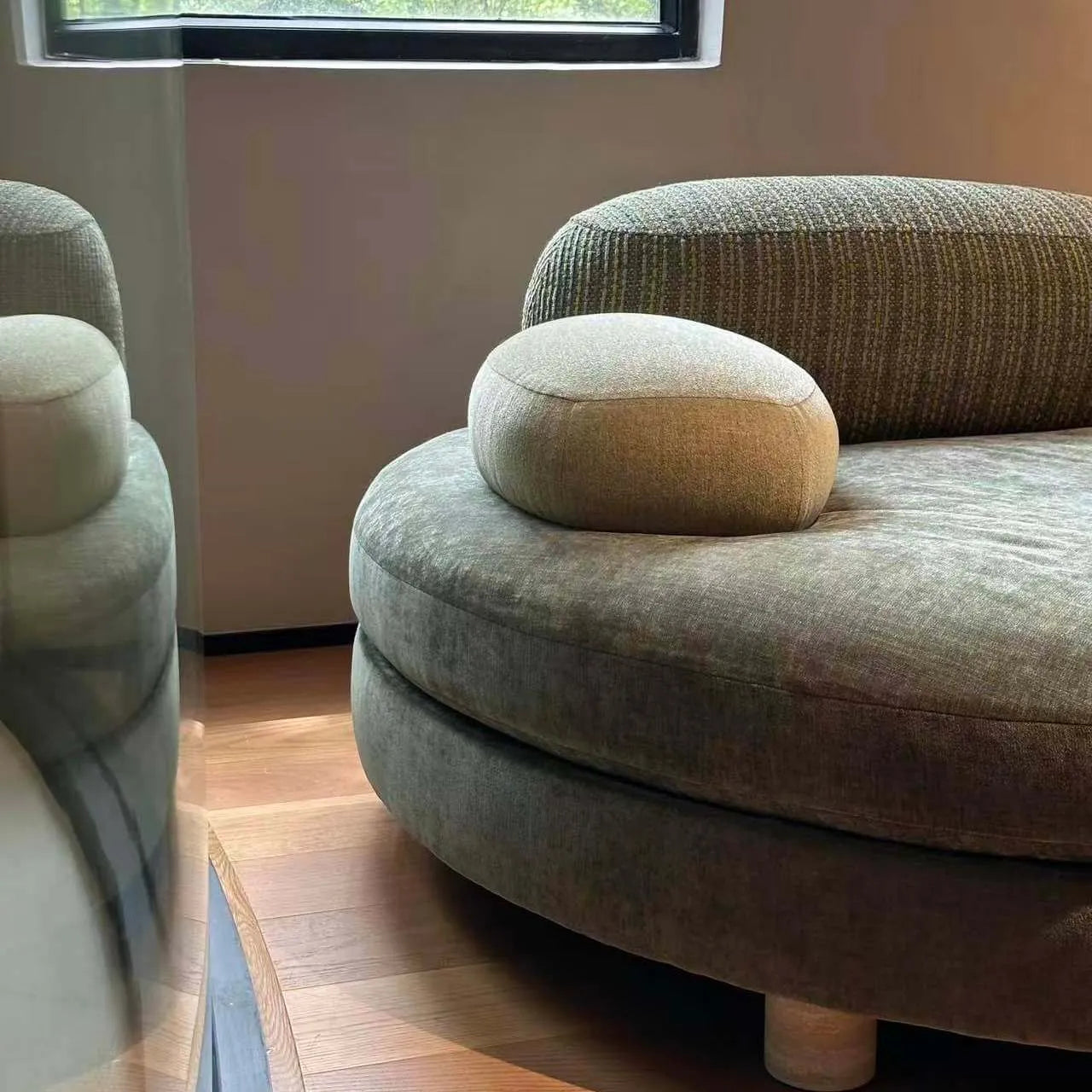 Sculptural Green Round Sofa With Asymmetrical Curve Back for Open Living