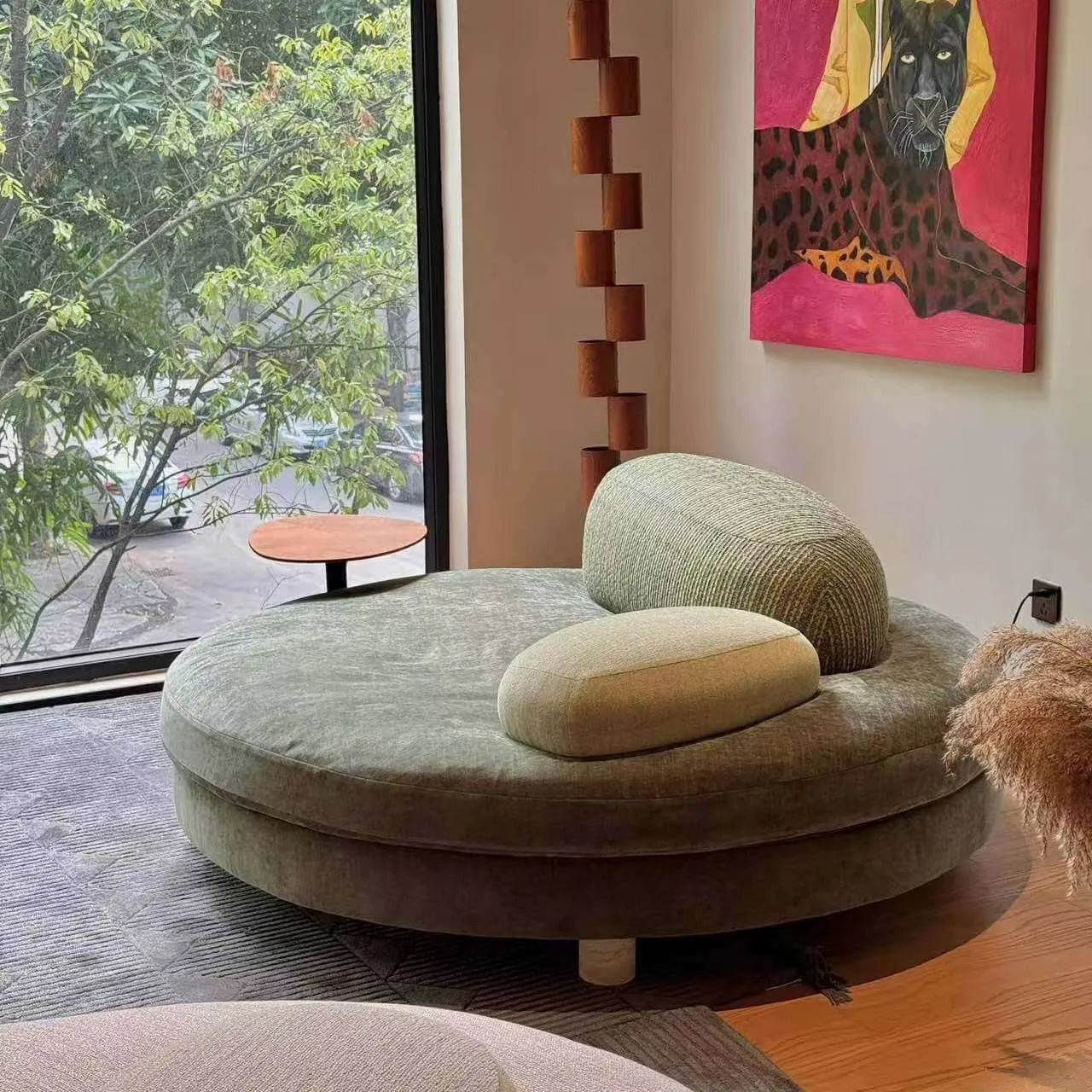 Sculptural Green Round Sofa With Asymmetrical Curve Back for Open Living Main Product Image Main image