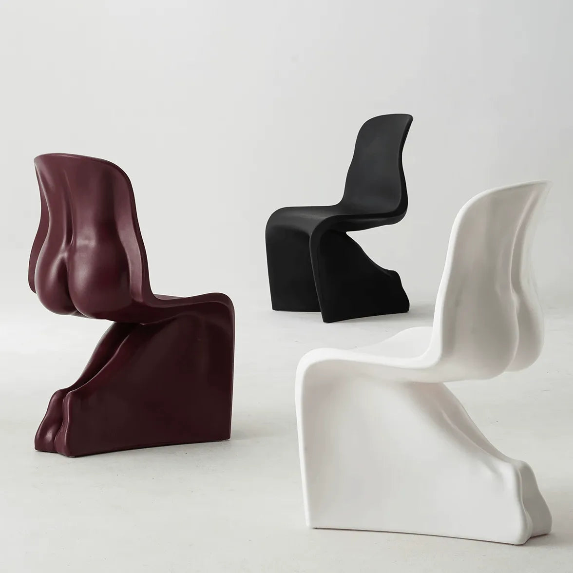 Sculptural Her Chair Dining Chair Series in Glossy Curved Silhouettes