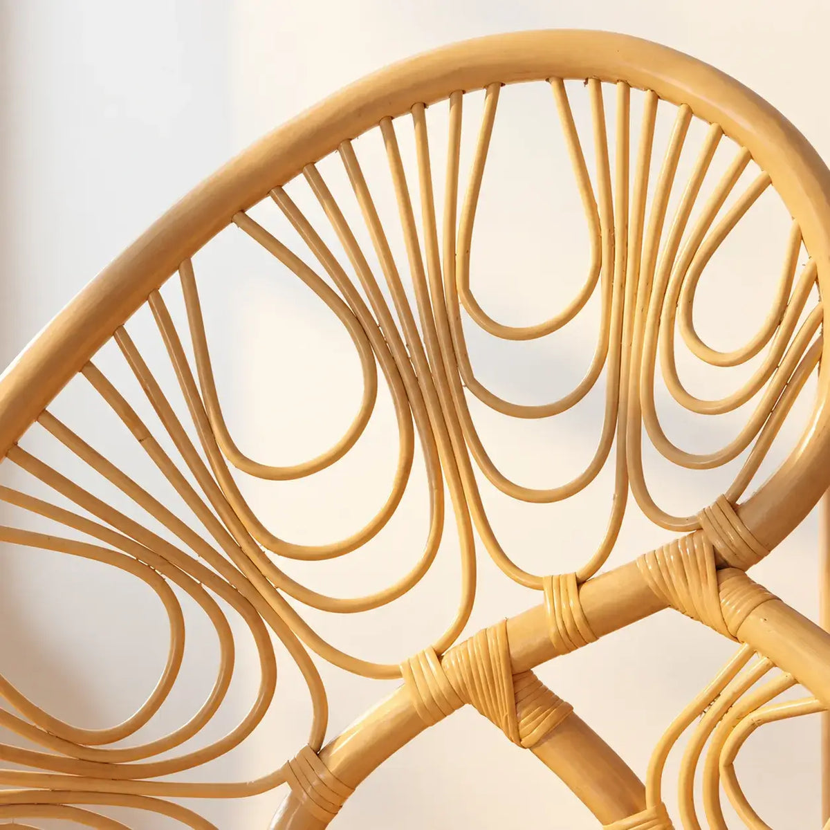 Sculptural Honey-Tone Rattan Accent Chair with Phoenix Back and Resort Style