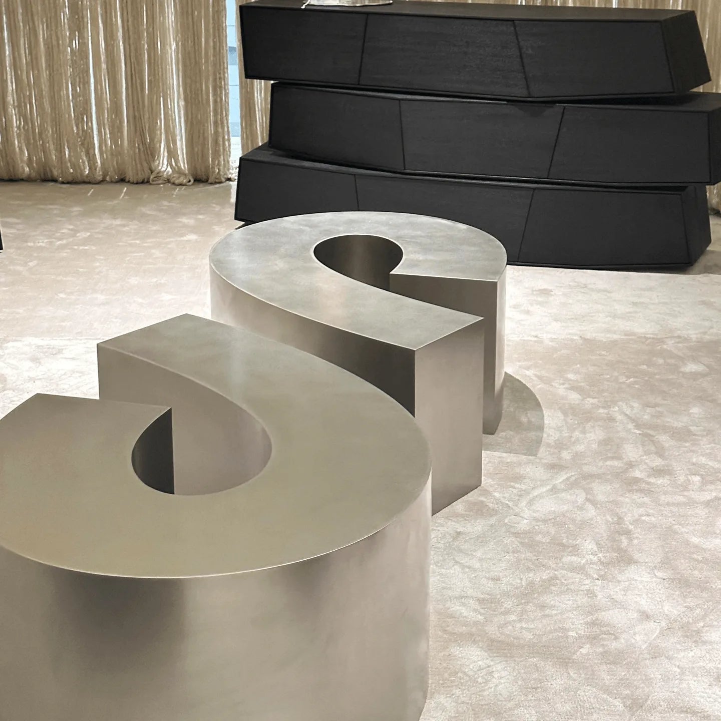Sculptural Infinity-Form Stainless Steel Coffee Table with Matte Brushed Finish