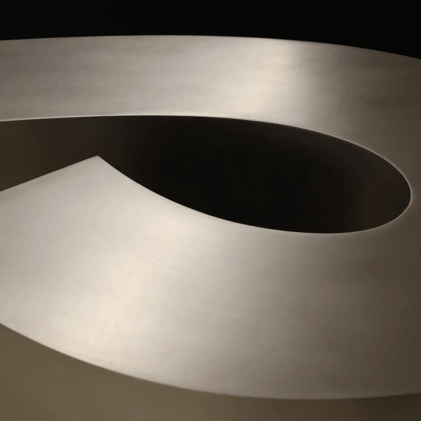 Sculptural Infinity-Form Stainless Steel Coffee Table with Matte Brushed Finish