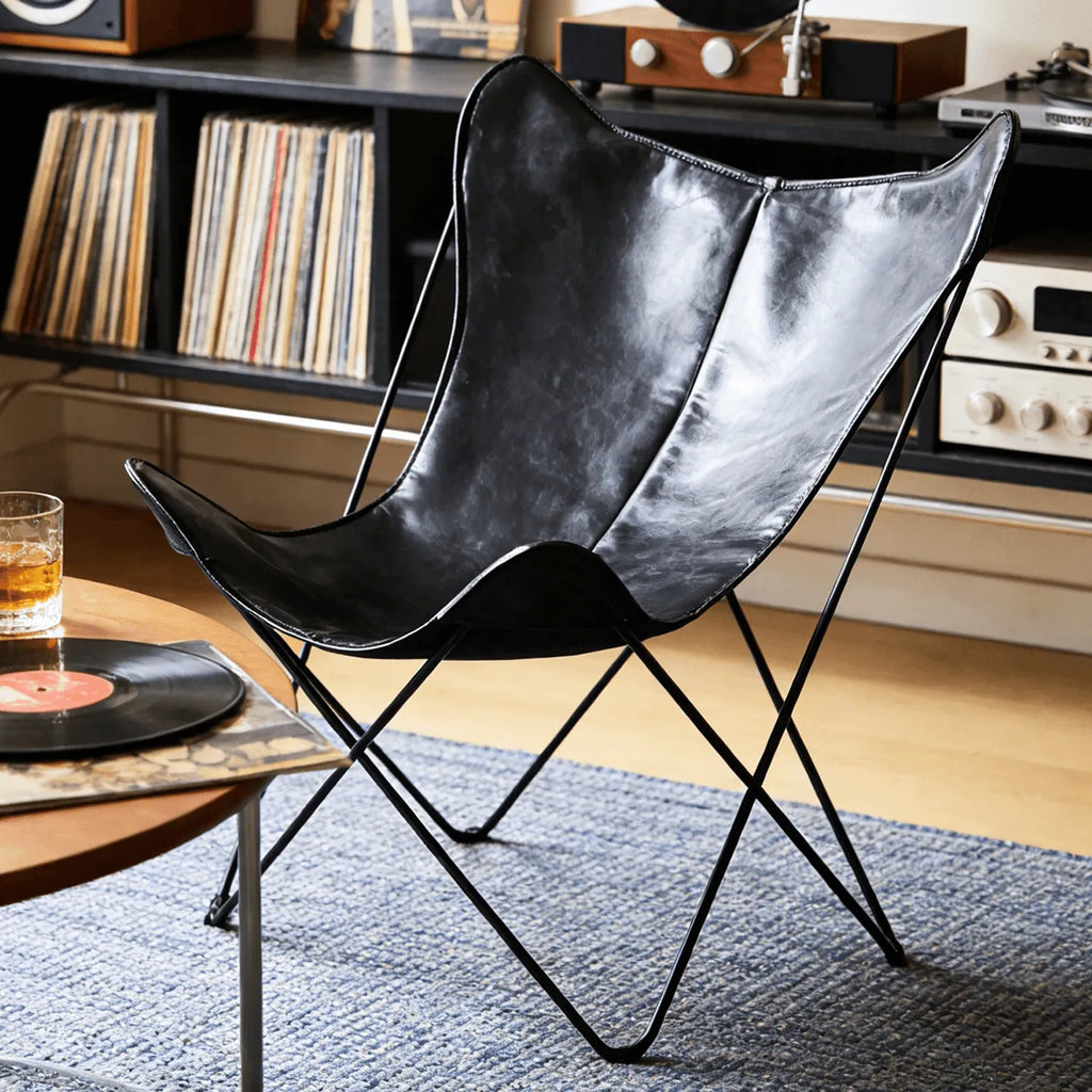 Sculptural Leather Butterfly Chair with Ergonomic Wingback Design