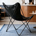 Sculptural Leather Butterfly Chair with Ergonomic Wingback Design