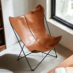 Sculptural Leather Butterfly Chair with Ergonomic Wingback Design
