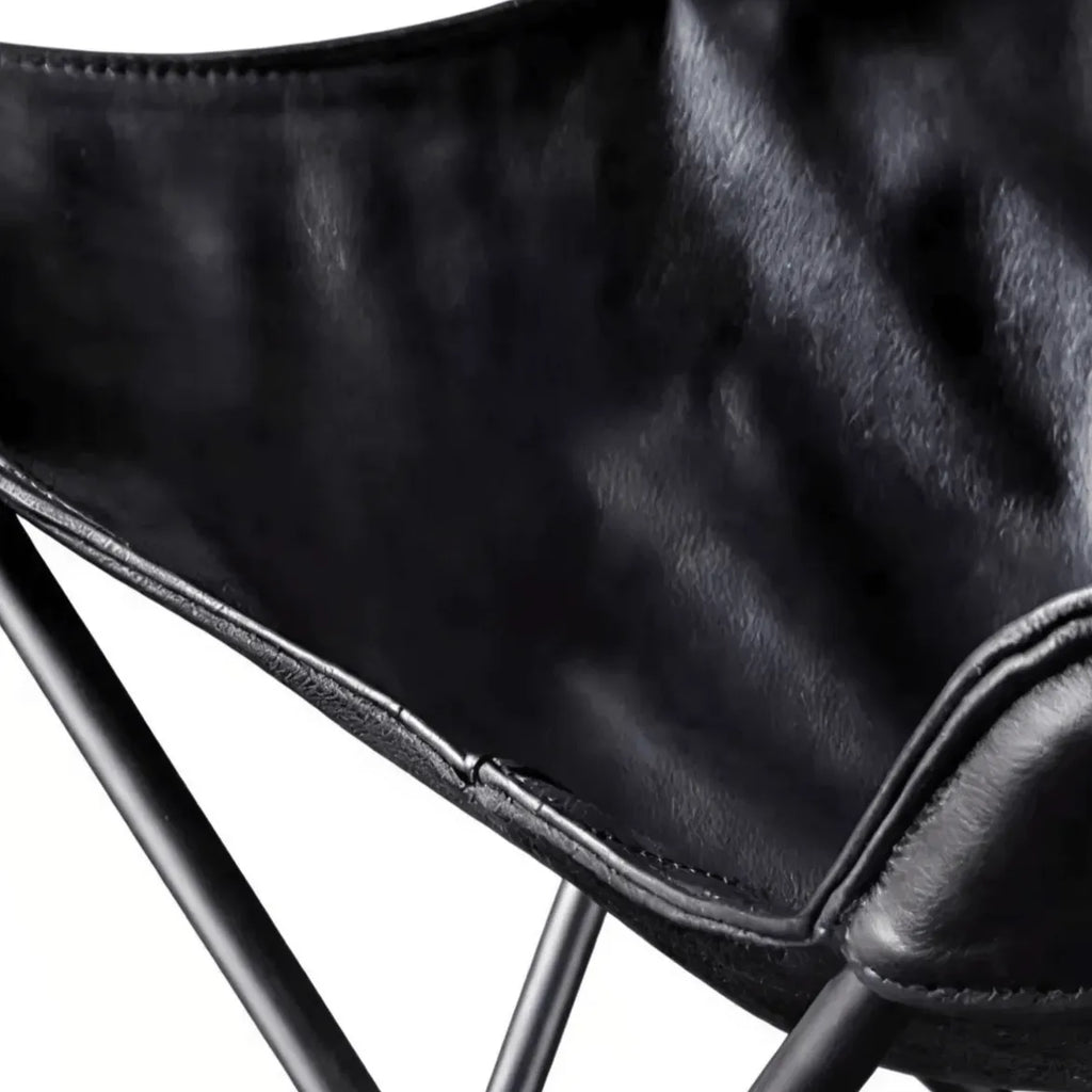 Sculptural Leather Butterfly Chair with Ergonomic Wingback Design