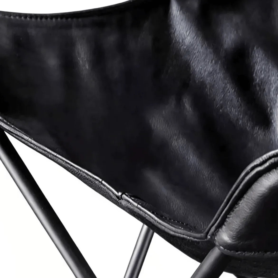 Sculptural Leather Butterfly Chair with Ergonomic Wingback Design