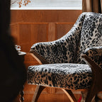 Sculptural Leopard Wingback Chair Series with Exposed Wood Frame and Rich Textures