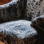 Sculptural Leopard Wingback Chair Series with Exposed Wood Frame and Rich Textures