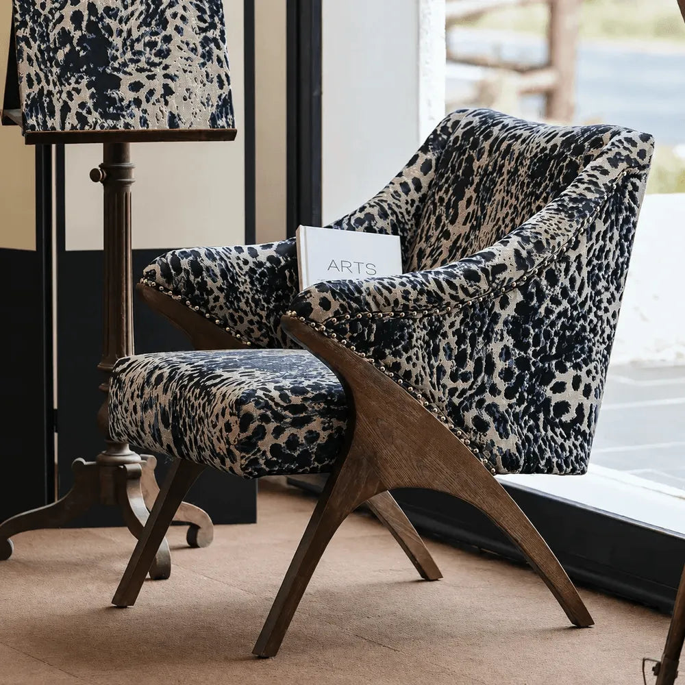 Sculptural Leopard Wingback Chair Series with Exposed Wood Frame and Rich Textures Main Product Image