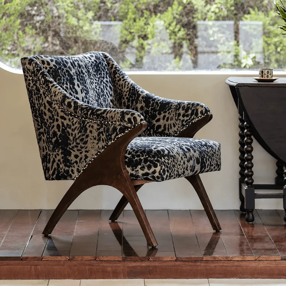 Sculptural Leopard Wingback Chair Series with Exposed Wood Frame and Rich Textures